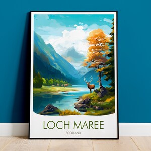 May include: A scenic poster featuring a view of Loch Maree in Scotland. The poster depicts a lake surrounded by mountains, with a deer standing in the foreground. The text "Loch Maree, Scotland" is printed at the bottom of the poster.
