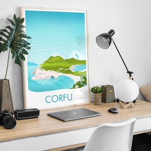 May include: A framed travel poster with the word "CORFU" in blue, depicting a scenic view of the island with green hills, blue water, and a bright sky. The poster is on a wooden desk with a laptop, lamp, and decorative items.
