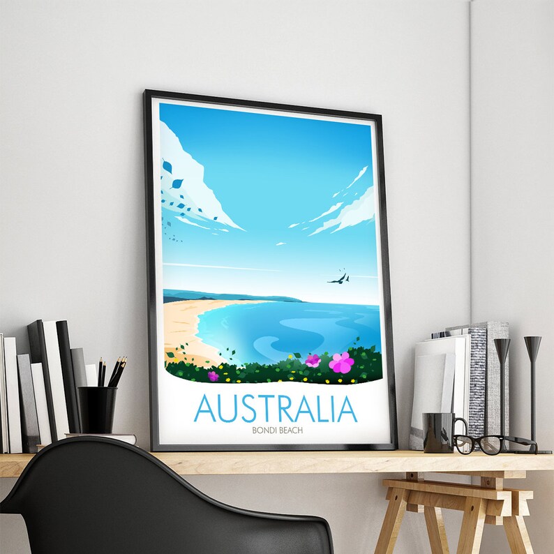 May include: A framed poster featuring a blue sky, white clouds, and a beach scene. The poster reads "Australia Bondi Beach" in blue text.