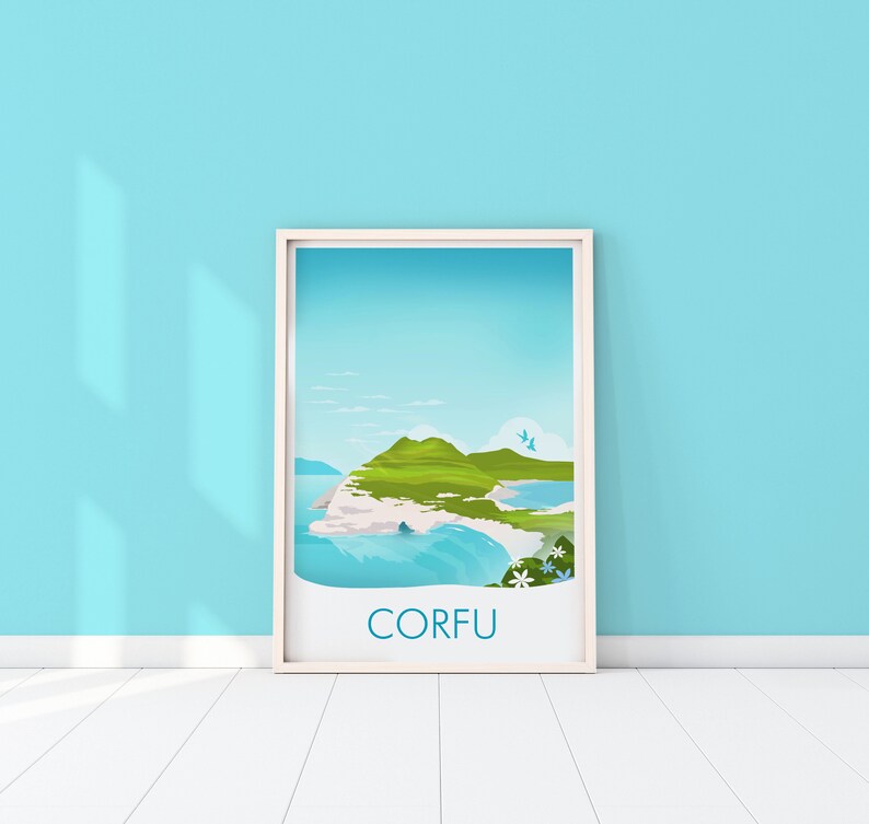 May include: A framed art print featuring a scenic illustration of Corfu. The artwork depicts green hills, blue water, and a clear sky. The word "CORFU" is printed in a teal color at the bottom of the print. The frame is white.