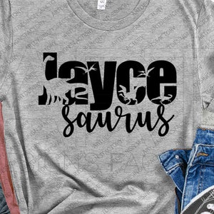 May include: Grey t-shirt with black text that reads "Fayce Saurus" with dinosaur silhouettes incorporated into the letters.