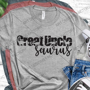 May include: Grey t-shirt with black text that reads "Great Uncle Saurus" with dinosaur silhouettes. The text is in a script font.