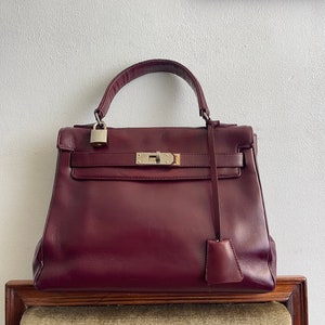 Vintage burgundy leather bag Kelly 28