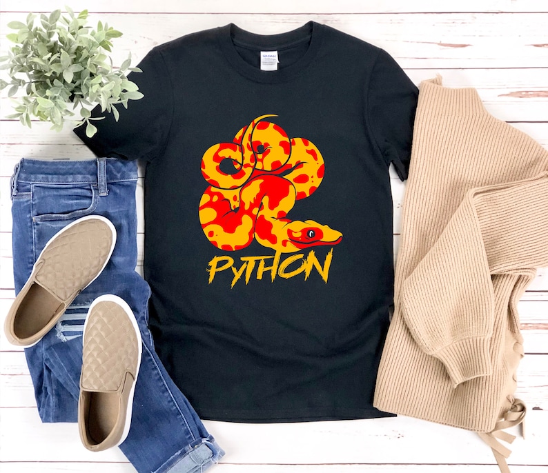 May include: Black t-shirt with a red and yellow python graphic and the word "PYTHON" in yellow letters.