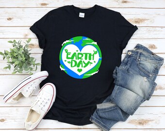 May include: Black t-shirt featuring a green and blue graphic of the Earth with a white heart that says "Earth Day" on it.