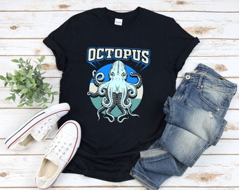 May include: A black t-shirt with a blue and white graphic of an octopus with the word "Octopus" in white letters above it.