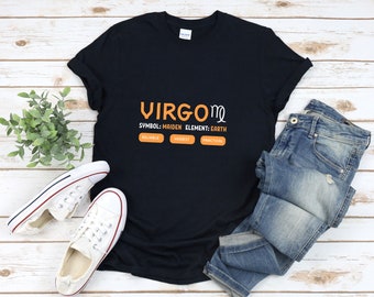 以下が含まれることがあります： オレンジ色の「VIRGO ♍」という文字が書かれた黒いTシャツ。 「SYMBOL: MAIDEN ELEMENT: EARTH」という文字もオレンジ色です。 テキストの下には、「RELIABLE」、「MODEST」、「PRACTICAL」と書かれた3つのオレンジ色のボタンがあります。