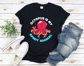 May include: Black t-shirt featuring a graphic of a red octopus with the text "Octopus is my spirit animal" in blue and white.