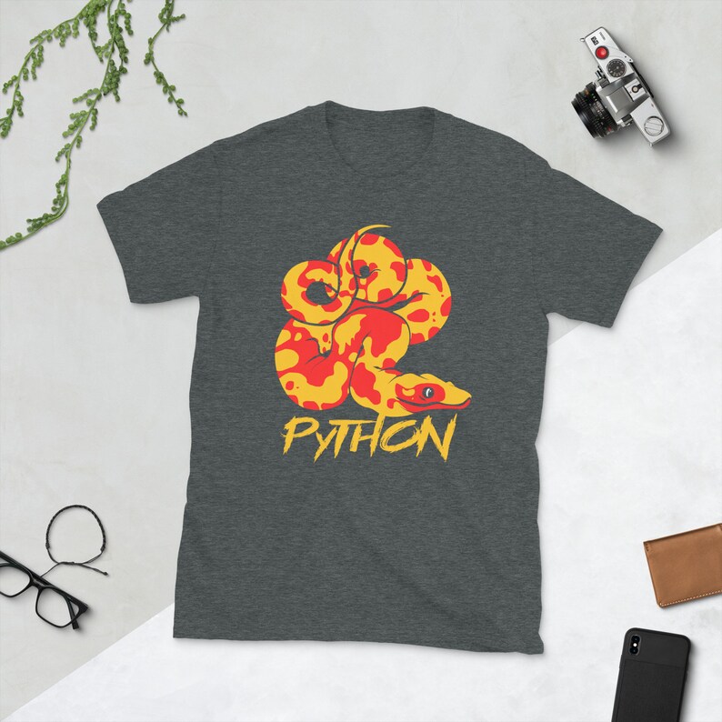 May include: A dark gray t-shirt with a yellow and red python snake illustration and the word "PYTHON" in yellow lettering.