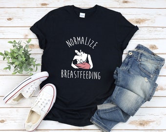 May include: Black t-shirt with white text that reads "Normalize Breastfeeding" and a graphic of a woman breastfeeding a baby.