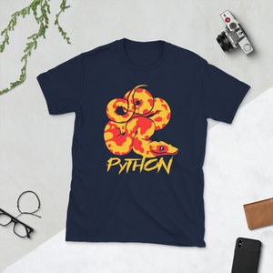 May include: A navy blue t-shirt with a cartoon illustration of a yellow and red python with the word "PYTHON" printed in yellow below the snake.