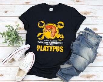 May include: A black t-shirt with a yellow and orange graphic of a platypus. The graphic includes the text "With all our powers combined we are Platypus".