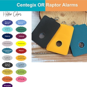 May include: Three leather holders in black, yellow, and teal, each with a circular window and a silver clasp. The image also displays a color chart with various options like Royal Blue, Green, and Pink, with the text "Centegix OR Raptor Alarms" at the top.