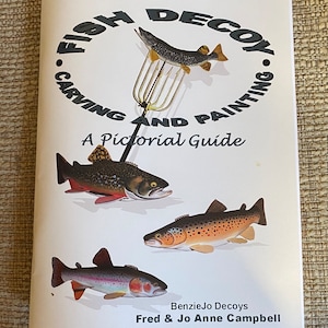 May include: A pictorial guide titled "Fish Decoy Carving and Painting" features illustrations of fish and a spear. The cover includes the text "BenzieJo Decoys" and the names "Fred & Jo Anne Campbell".