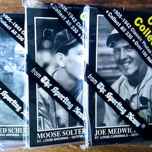 May include: Three vintage baseball cards from the Conlon Collection. The cards feature black and white photos of baseball players from the 1905-1942 era. The cards are from The Sporting News and feature the players' names and team affiliations. The text on the cards reads "1905-1942 Classic Photos of Charles Conlon * Collect All 330 * Over 100 Hall of Famer Cards".