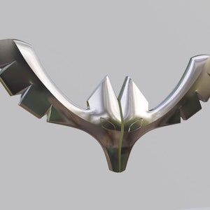 Może przedstawiać: Srebrna metalowa rzeźba stylizowanego ptaka z rozpostartymi skrzydłami. Rzeźba ma ostry, kanciasty design i elegancki, nowoczesny styl.