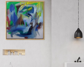 May include: Abstract painting in shades of blue, green, yellow, and white. The painting is framed in gold and hangs on a white wall above a white bathtub.
