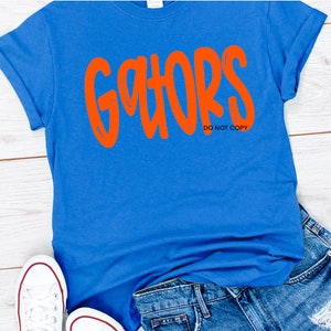 GATORS shirt,