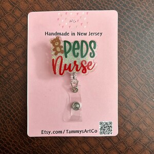 Carrete de insignia de enfermera de pediatría