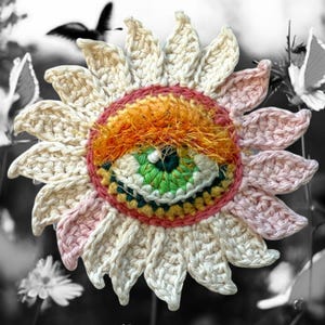 Blommande öga Virkmönster PDF