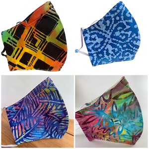 Best Fitting washable face mask with filter pocket, nose wire, adjustable ear loops. Beautiful batiks. Breathable, soft lining. SHIPS NOW