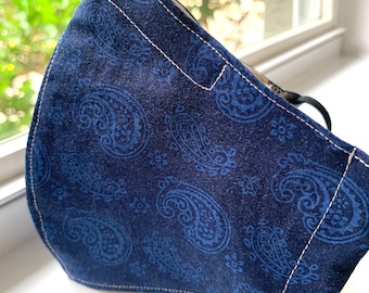 Best fitting washable face mask with filter pocket, nose wire and adjustable ear loops. Soft, breathable lining. Blue paisley. SHIPS NOW