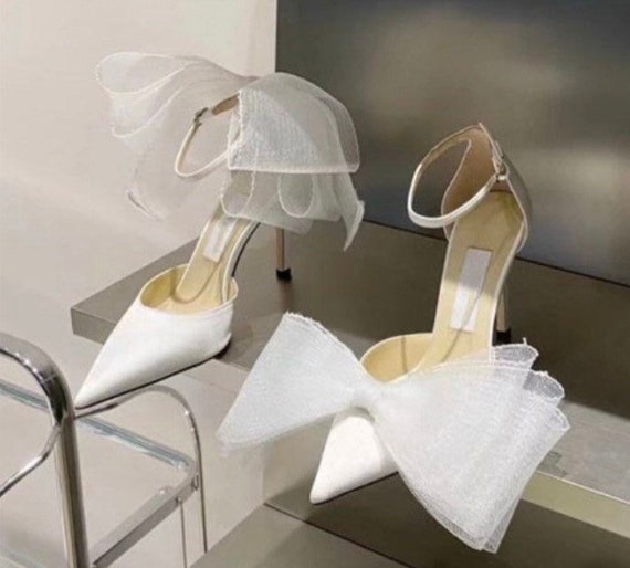 heels with bow on back