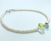 Perlenarmband mit Mondstein Peridot und Blautopas