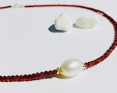 delicate garnet necklace with pearl