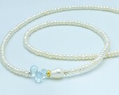 Perlen Kette mit Blautopas, Silber bicolor