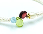 Armband Perle, Granat, Peridot, Blautopas, Silber bicolor