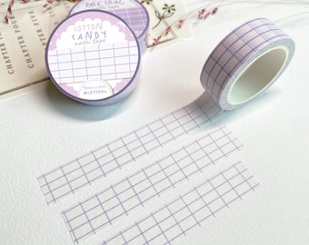May include: A roll of pale lilac grid patterned washi tape with the text "COTTON CANDY washi tape" and "15mm x 10m @LETTOON" on the label.