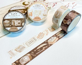 May include: Three rolls of washi tape with illustrations of books, a typewriter, a quill pen, and other academic-themed imagery. The tape is 15mm wide and 10m long. The text on the tape reads "DARK Academia washi tape" and "LIGHT Academia washi tape".