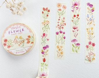 May include: A roll of washi tape with a floral design. The tape is 1.5 cm wide and 10 meters long. The tape is labeled "Lovely Flower washi tape" and "Lettoor".