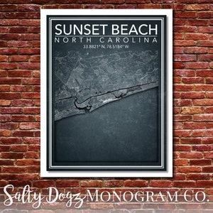 May include: A black and white map of Sunset Beach, North Carolina, with the text "Sunset Beach North Carolina 33.8821° N, 78.5184° W" and the text "Salty Dogz MONOGRAM CO."