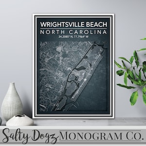 May include: A black and white map print of Wrightsville Beach, North Carolina with the text "WRIGHTSVILLE BEACH NORTH CAROLINA 34.2085° N, 77.7964° W" and the text "Salty Dogz MONOGRAM CO."