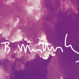 May include: A purple and white watercolor background with the text "Sam B. Martin 4 1/8 50" written in white.
