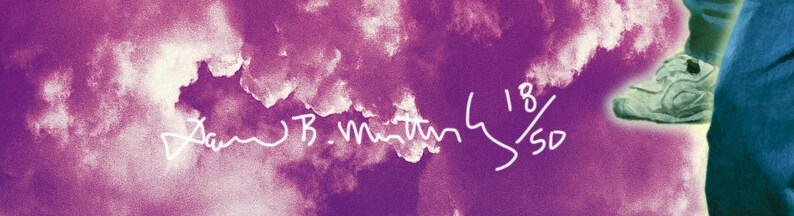 May include: A purple and white watercolor background with the text "Sam B. Martin 4 1/8 50" written in white.