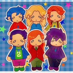 May include: A set of six illustrated chibi-style character stickers arranged in two rows. The characters feature diverse hair colors including blue, blonde, red, purple, and orange, wearing colorful outfits with small blue pendant necklaces.