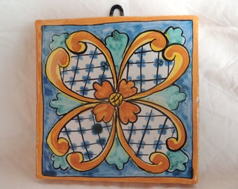 15x15 tile in Sicilian terracotta, hand decorated.