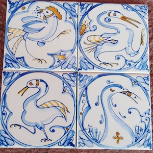 10x10 Sicilian tiles, hand decorated.