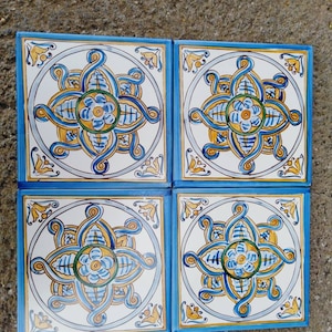 40x40 panel, made on 20x20 Sicilian ceramic tiles, decorated by hand.