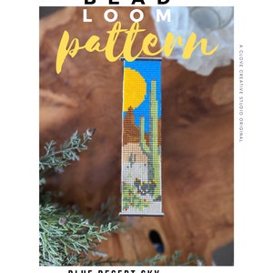 May include: A bead loom pattern for a bracelet featuring a desert landscape with a blue sky, a yellow sun, brown mountains, green cacti, and a white base.