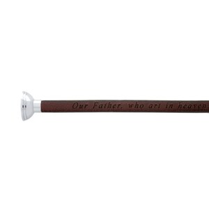 May include: A brown leather walking stick with a silver tip. The stick is engraved with the words "Our Father, who art in heaven..."