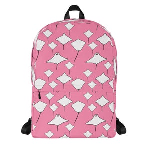 May include: Pink backpack featuring a repeating pattern of white manta rays. The backpack has black straps, a black handle, and a black zipper. The design is a fun and colorful accessory for school or travel.