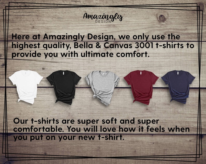 May include: Five Bella & Canvas 3001 t-shirts in white, black, gray, burgundy, and navy blue are displayed on a wooden background. The text reads "Amazingly Design" and describes the shirts as super soft and comfortable.