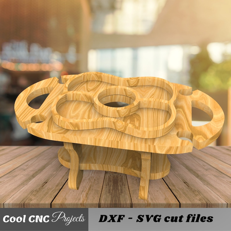 May include: Wooden serving tray with multiple compartments and a bottle holder. The tray is designed to be used as a portable serving station for parties or picnics.  The tray is made of natural wood and has a rustic look.  The tray is shown on a wooden table.