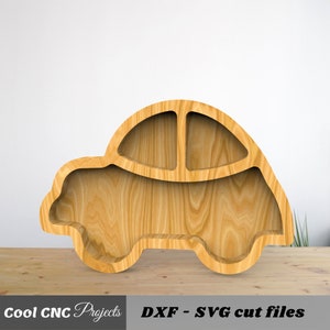 K&ouml;nnte beinhalten: Holzteller in Autoform mit drei F&auml;chern. Der Teller ist aus Naturholz und hat eine hellbraune Farbe. DXF - SVG cut files.