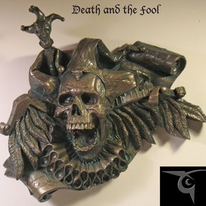 Death and the Fool laughing harlequin jester skull wall hanging