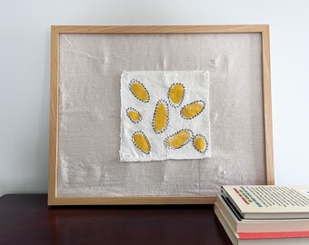 Embroidered textile wall hanging